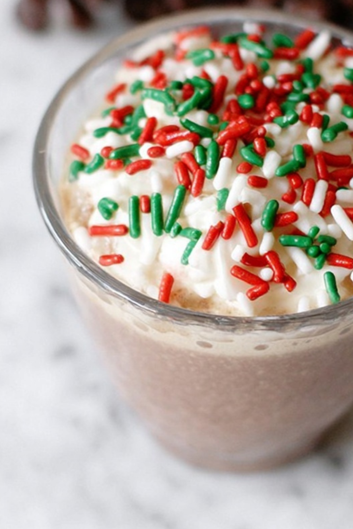 Christmas Coffee Blend with whipped cream and sprinkles