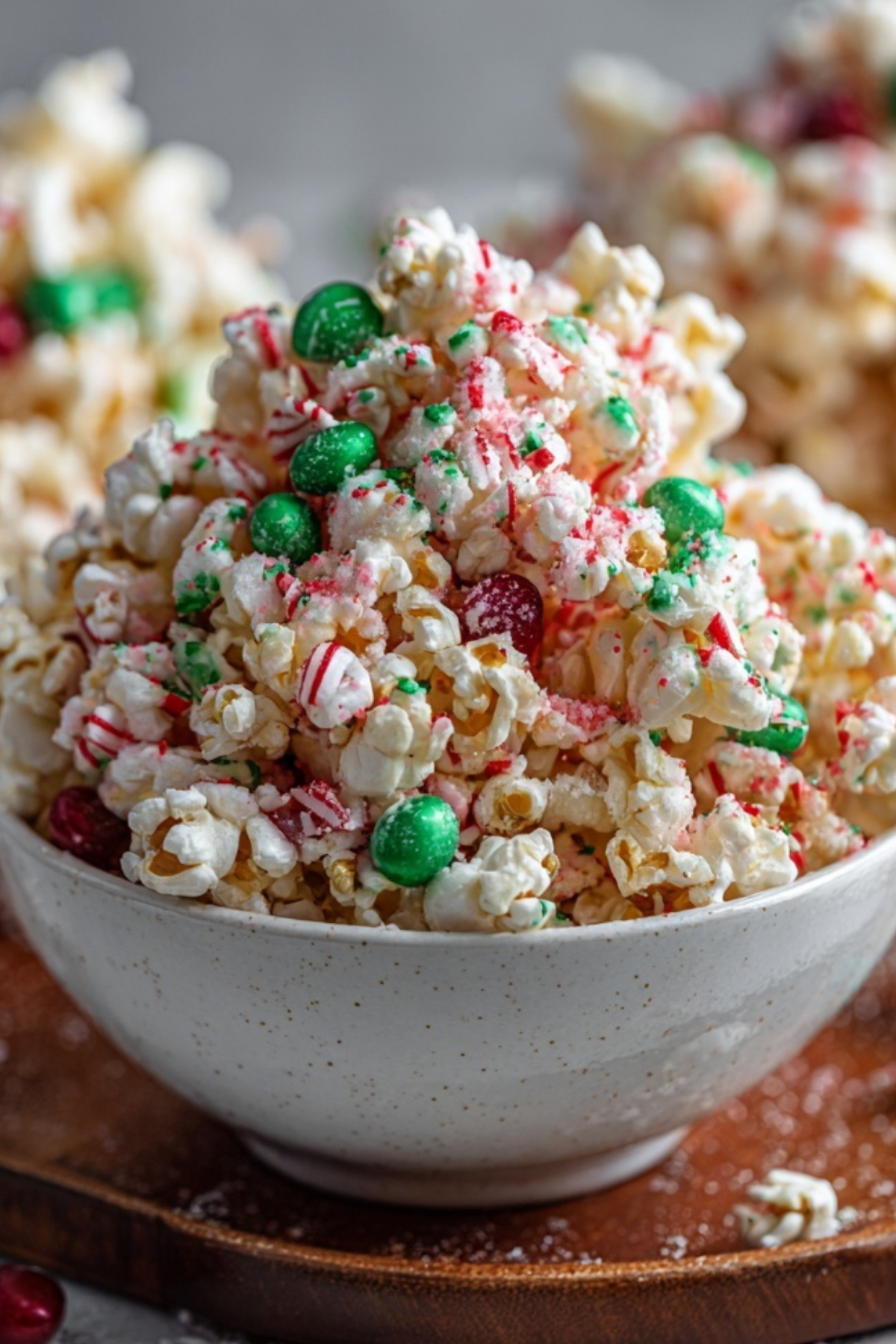 Christmas Popcorn Candy with white chocolate, M&Ms, and crushed candy canes
