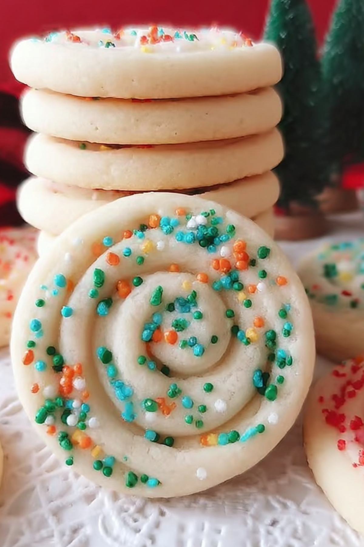 Christmas Sugar Cookies decorated with frosting and sprinkles