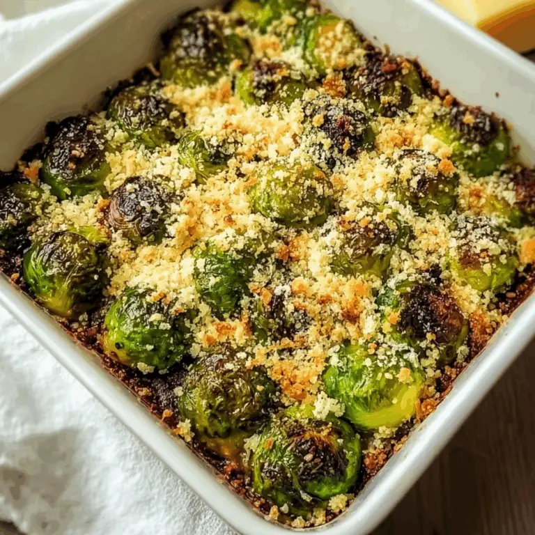 Crispy Parmesan Brussels sprouts with golden-brown edges and fresh herbs