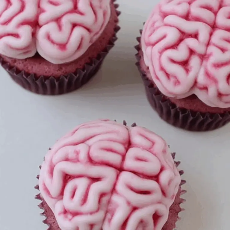 Zombie Brain Cupcakes with natural frosting and beet-colored cake
