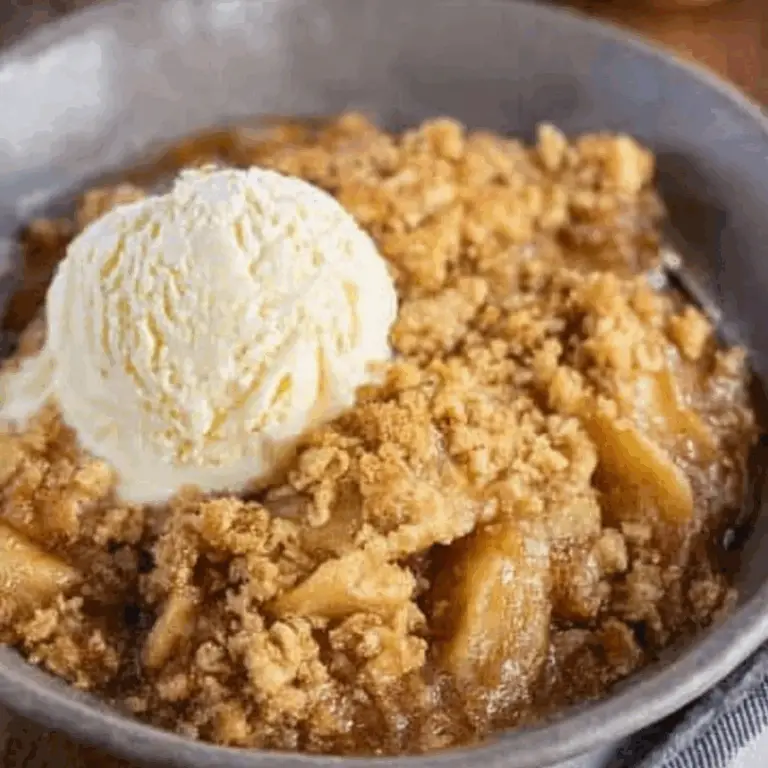 Ultimate Apple Crisp with cinnamon, apples, and a buttery topping