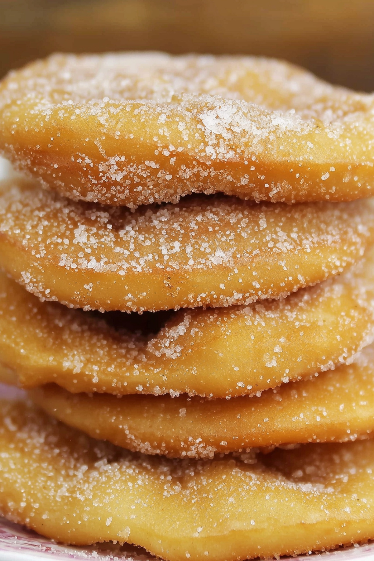 Homemade Bunuelos dusted with cinnamon sugar