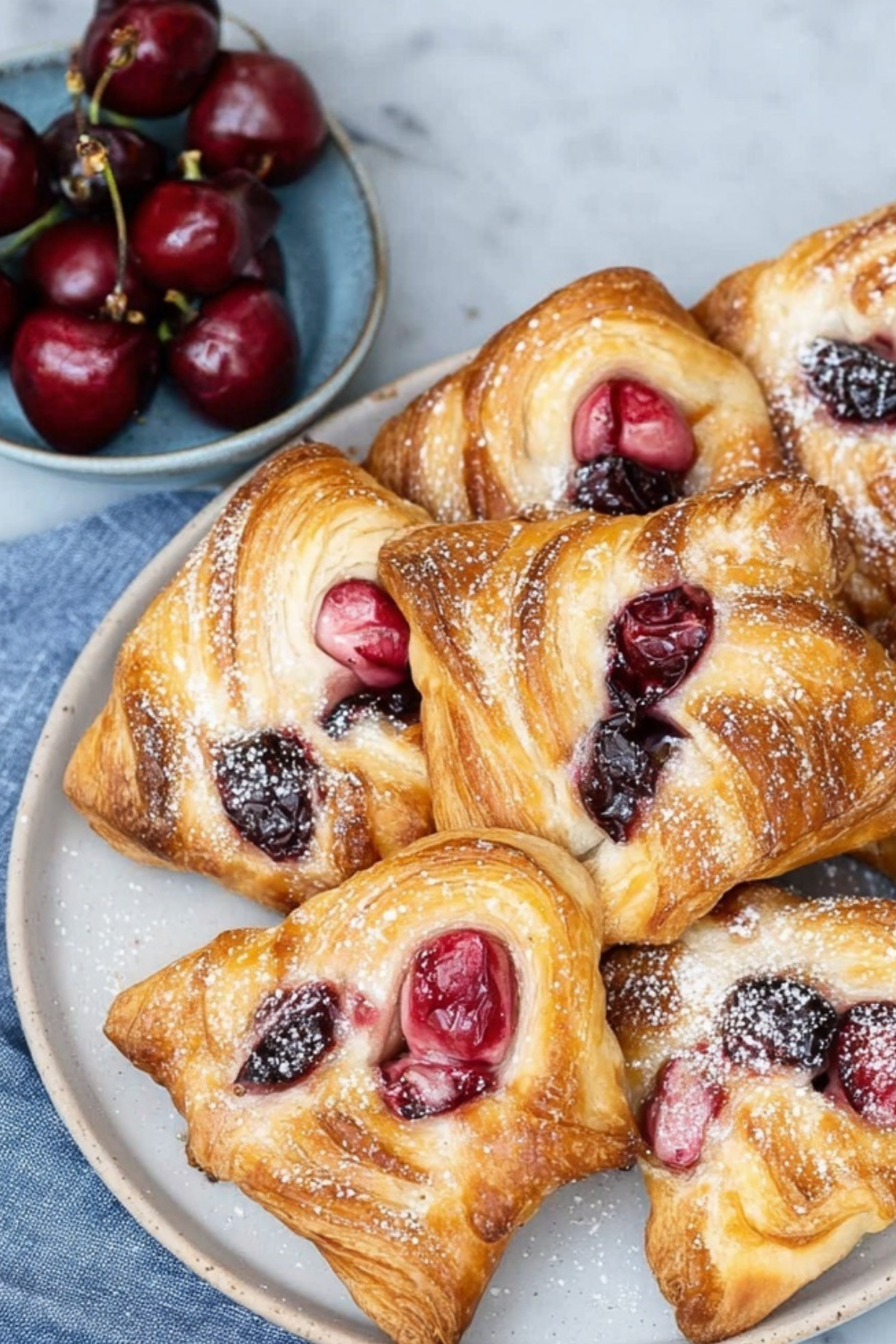 Cherry Danish with Puff Pastry on a baking tray