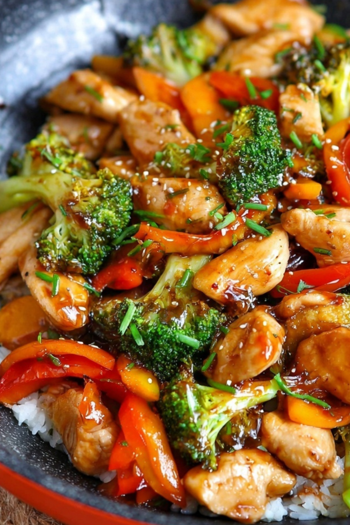 Chicken stir fry with vegetables in a skillet