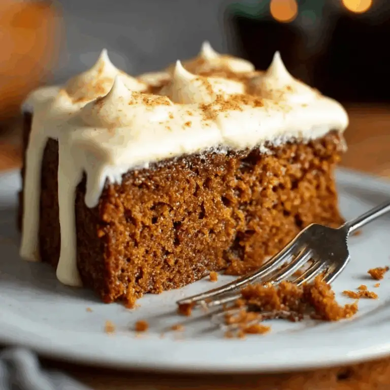 Gingerbread Cake with Luscious Cream Cheese Frosting topped with creamy frosting