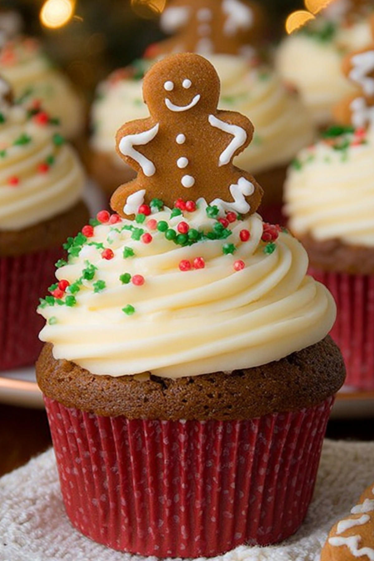 Gingerbread Cupcakes with Cream Cheese Frosting on holiday plate