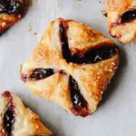 golden baked jam puff pastry tarts with sugar topping