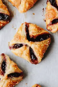 golden baked jam puff pastry tarts with sugar topping
