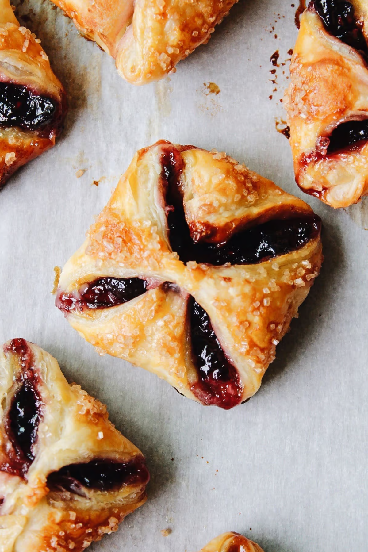baked jam puff pastry tarts with sugar topping