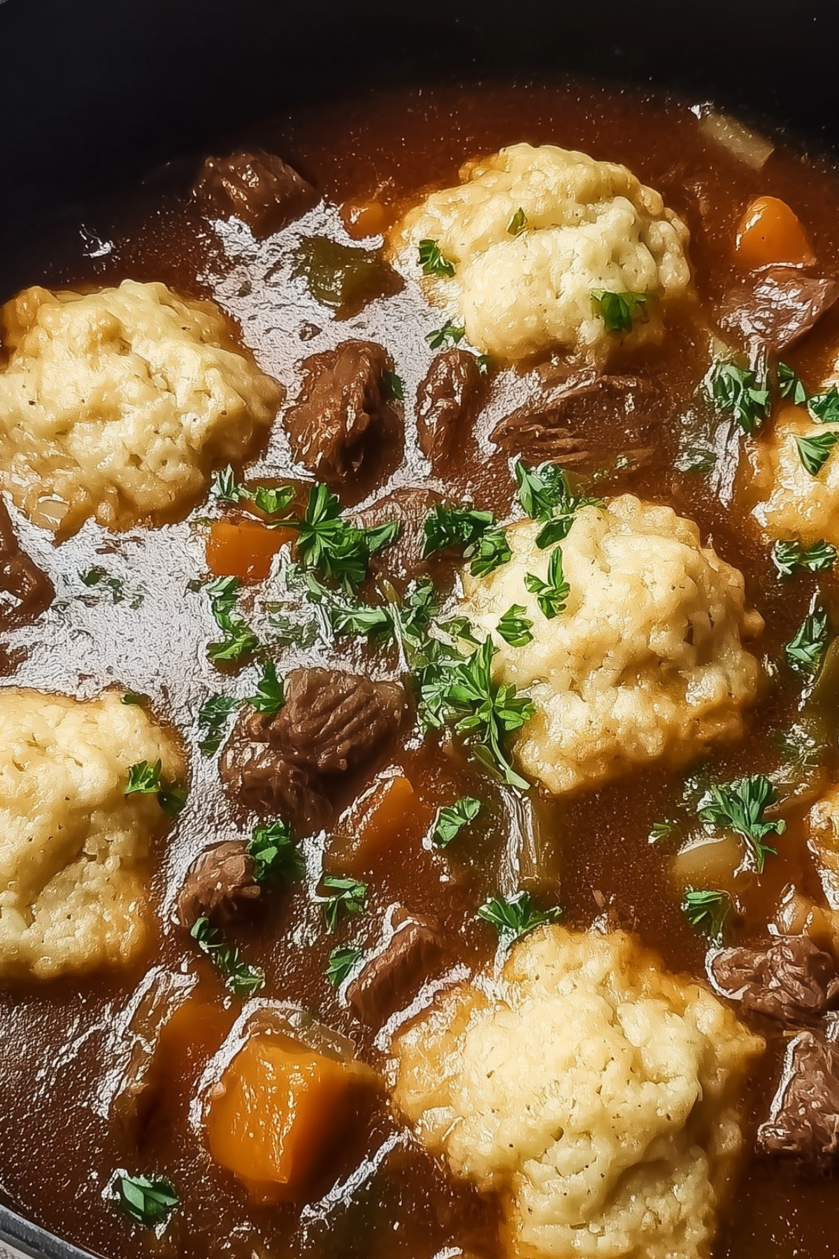 Hearty Beef Stew and Dumplings served hot in a bowl