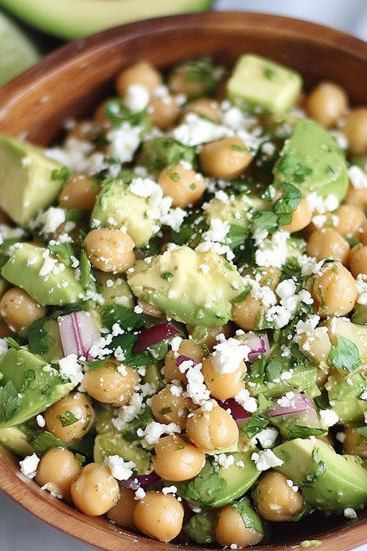 Chickpea, Avocado, & Feta Salad served fresh in a bowl