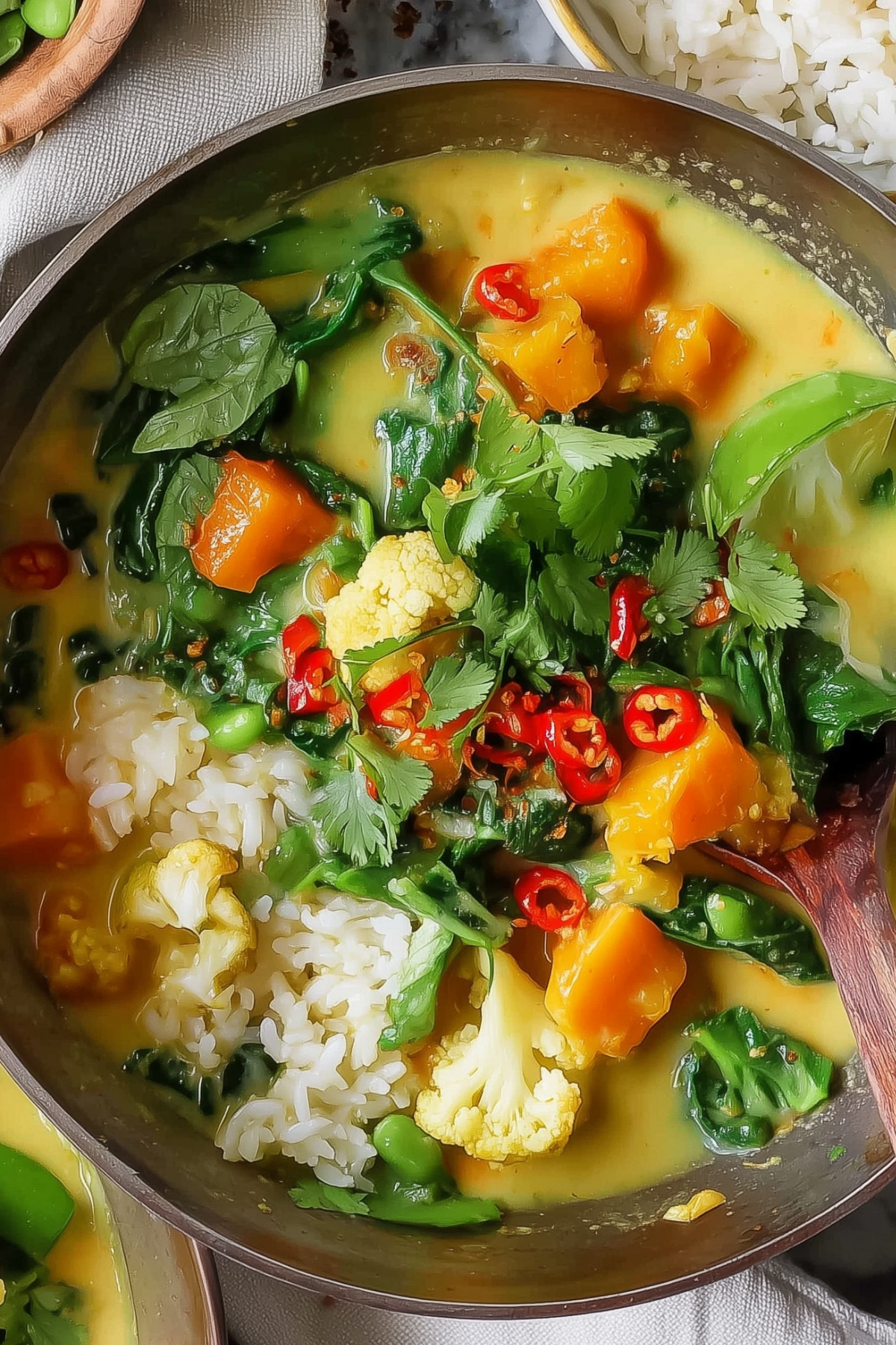 Coconut curry dish with vegetables and coconut milk in a bowl