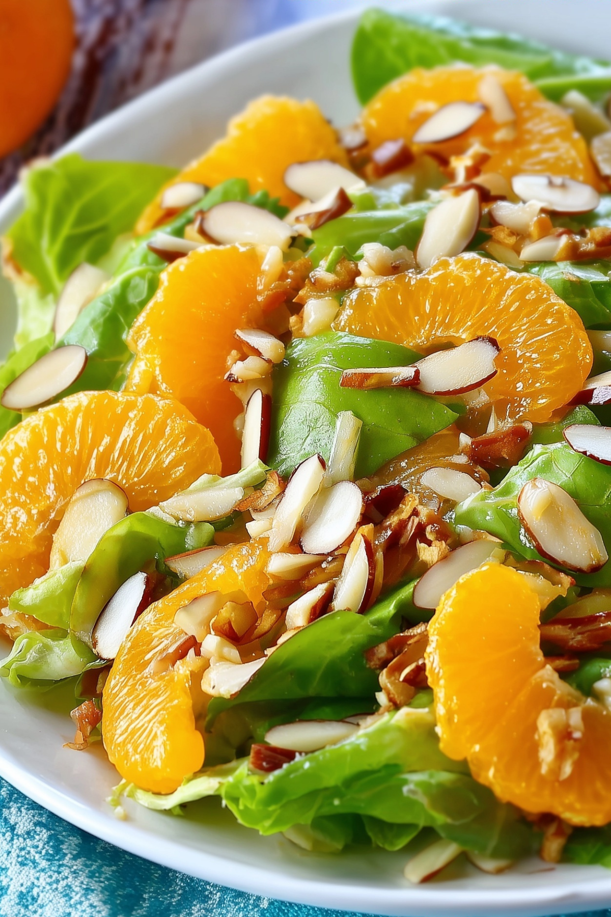 Mandarin Orange Almond Salad with sugared almonds and citrus dressing
