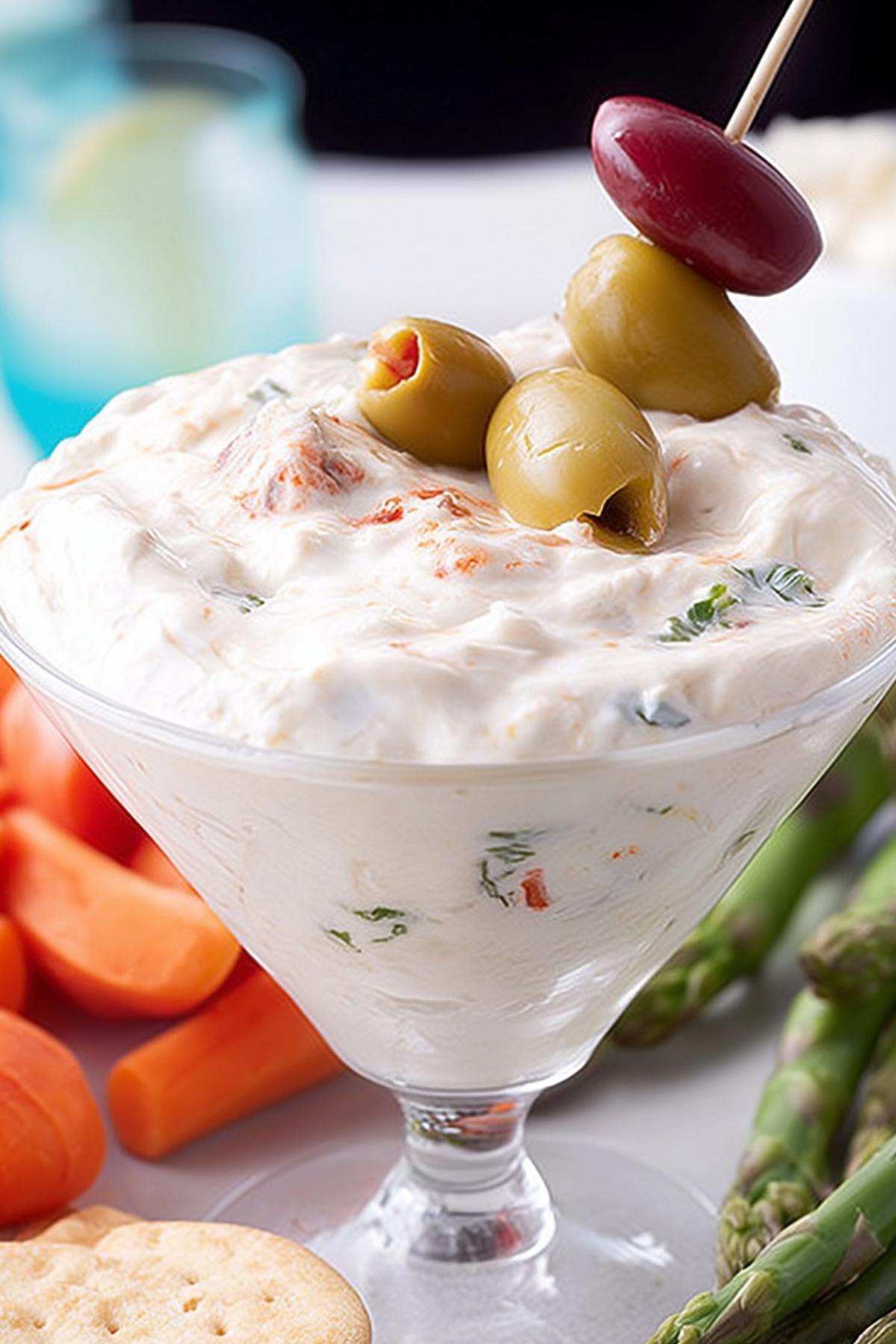 Martini Cheese Dip served with fresh vegetables in a martini glass
