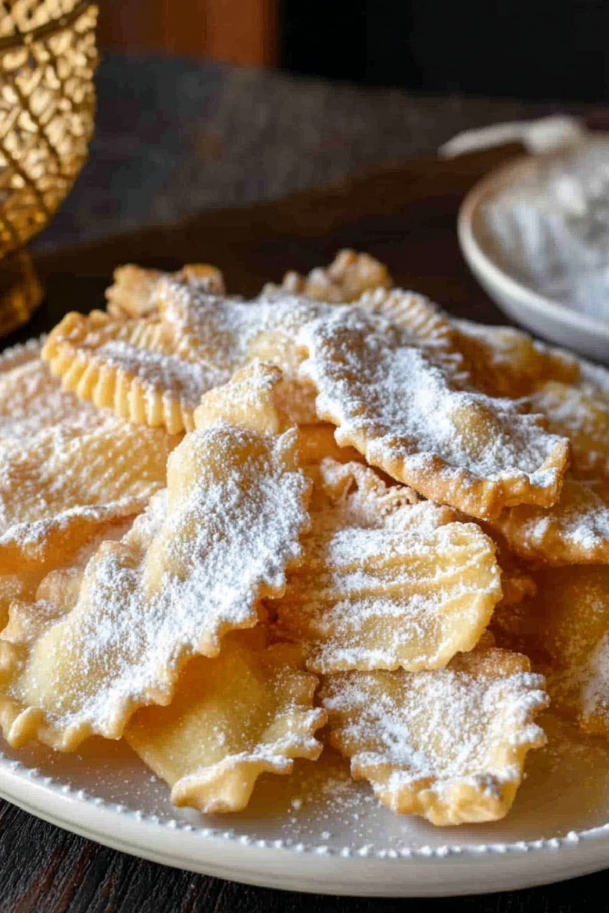 Crostoli traditional Italian fried pastry dusted with powdered sugar