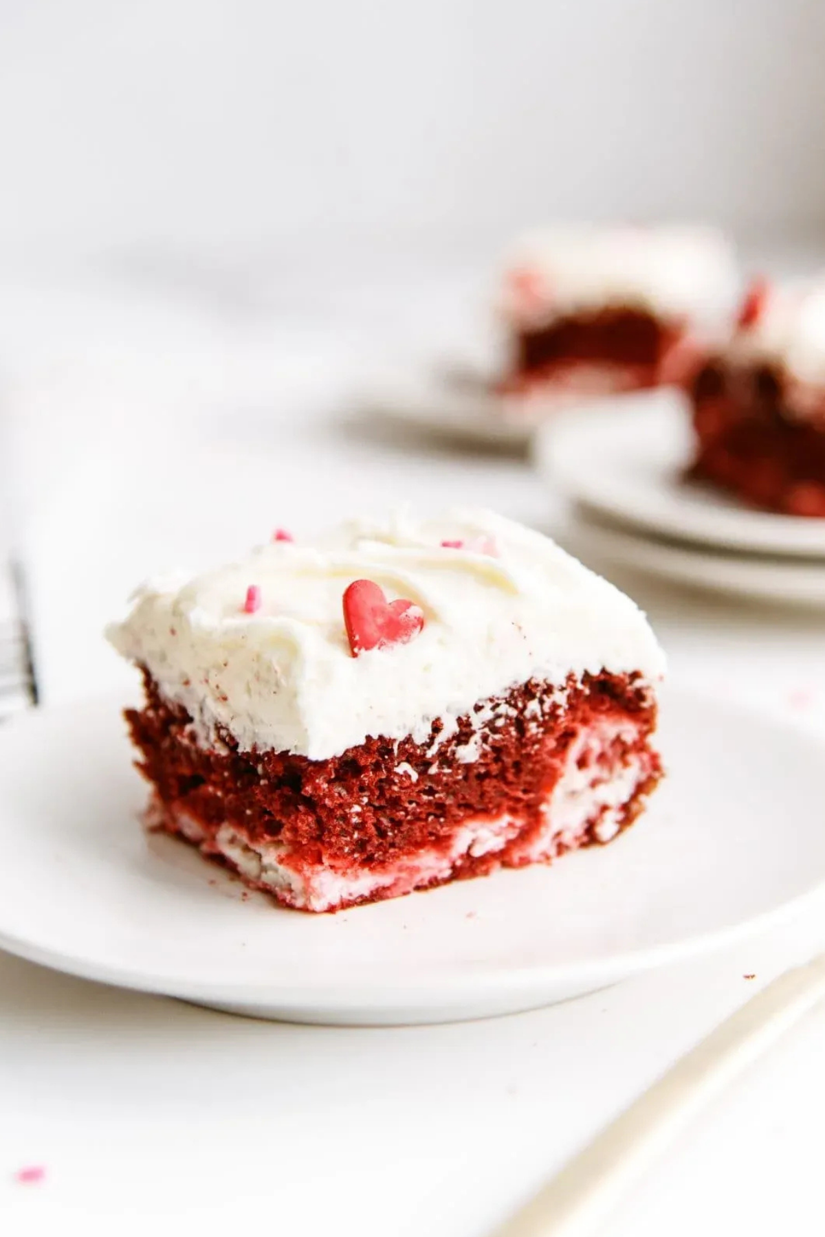 Red Velvet Cheesecake Swirl Cake with cream cheese frosting