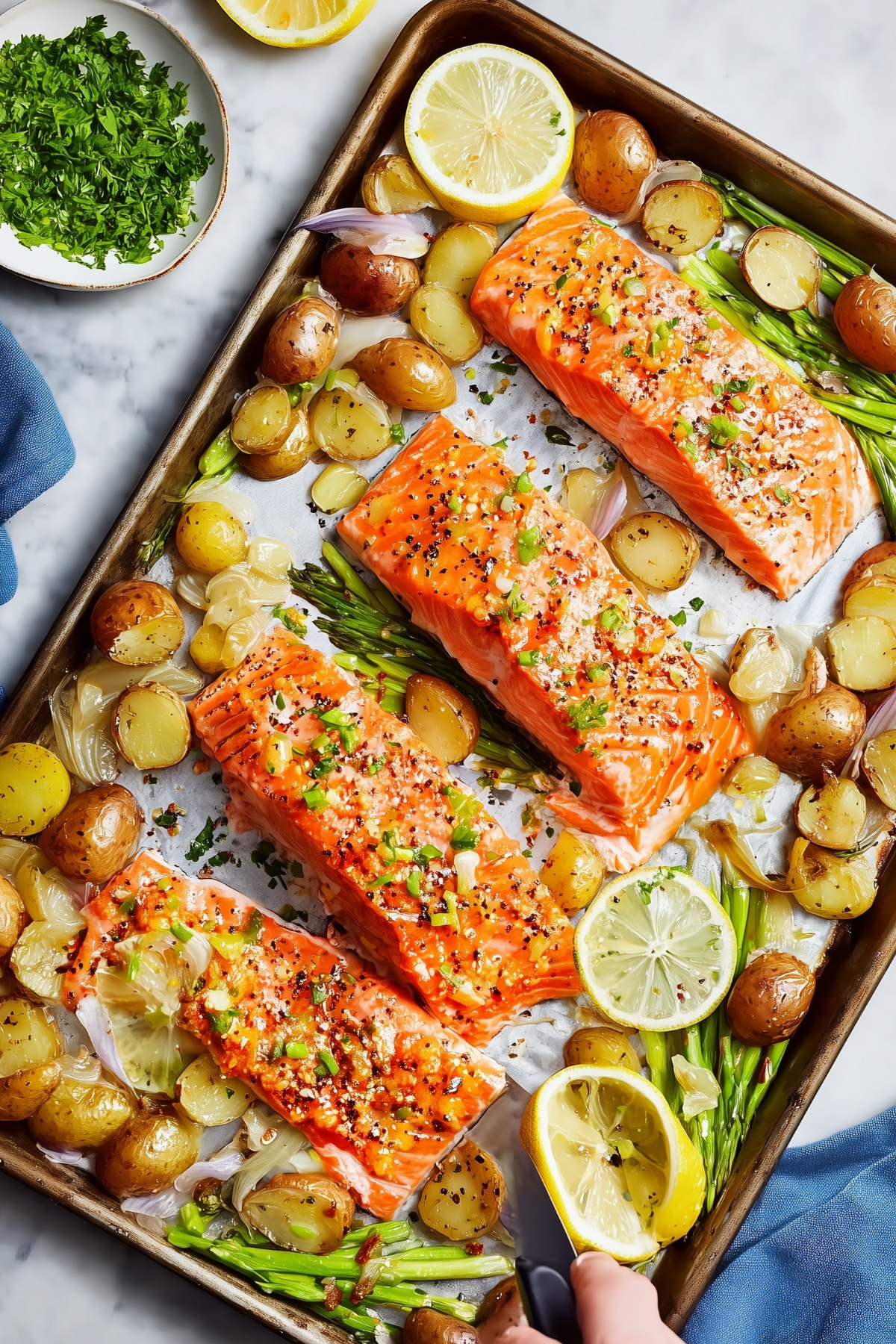 : Sheet Pan Lemon Pepper Salmon served with roasted vegetables
