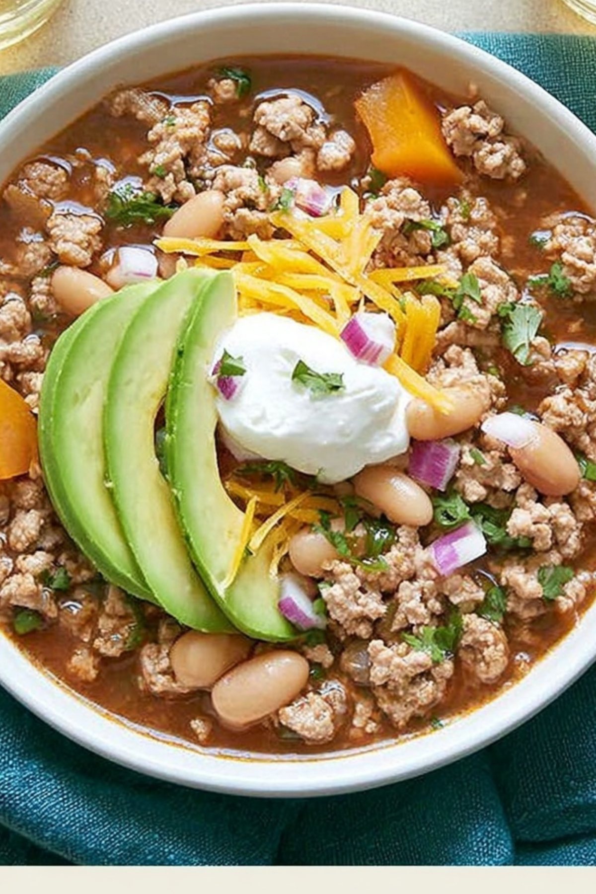 White Bean Turkey Chili Verde served in a bowl with toppings