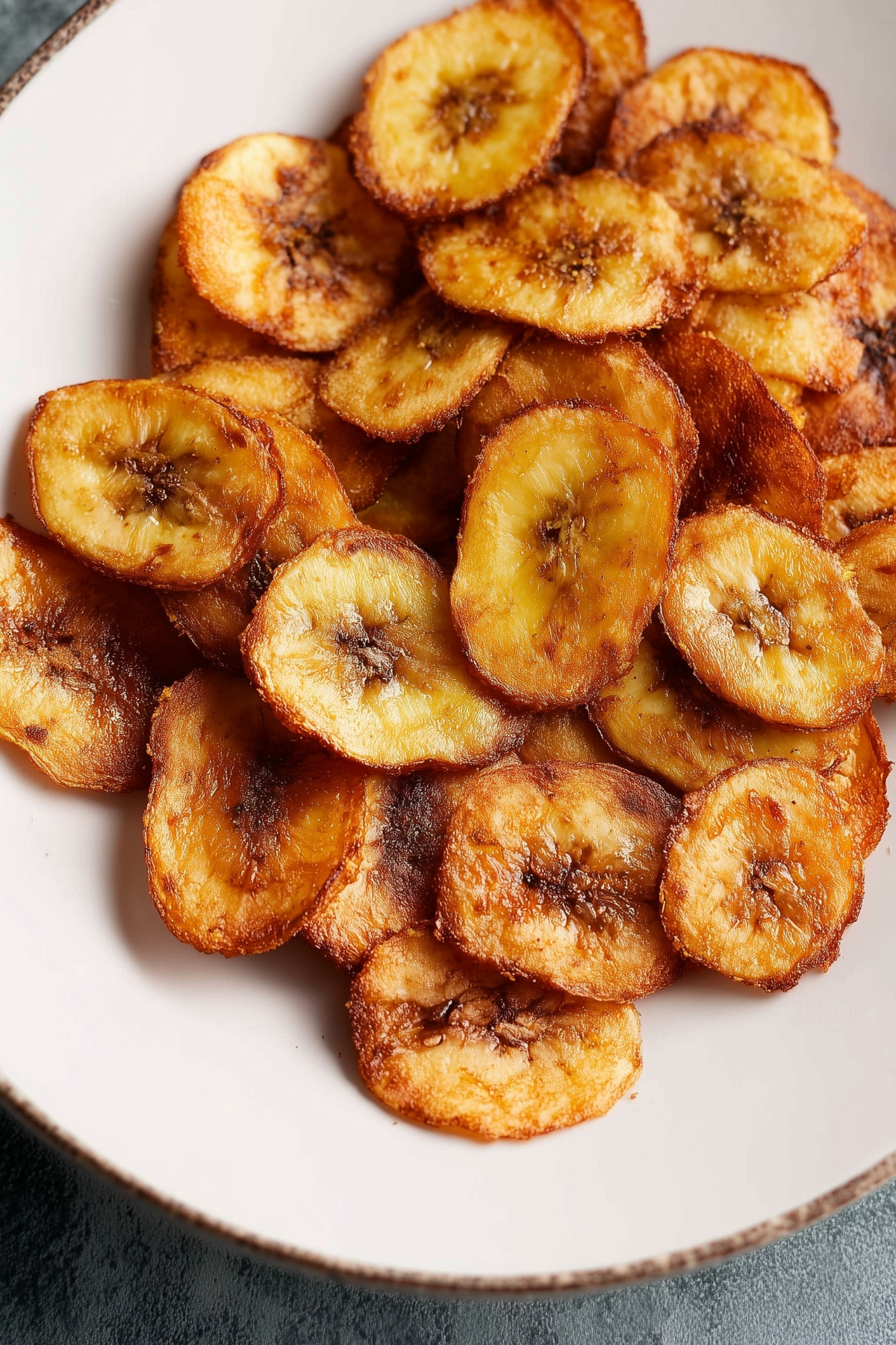 Crispy homemade Air Fryer Banana Chips in a bowl