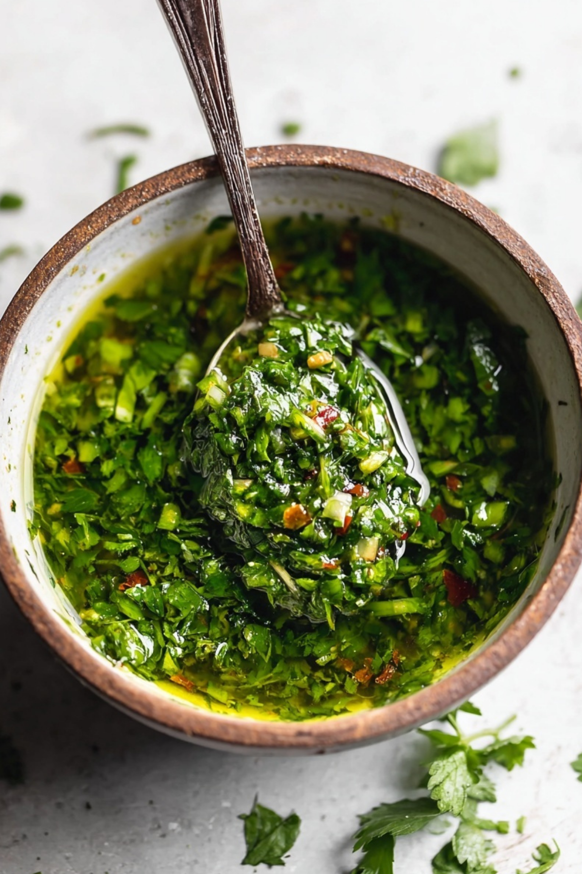 Fresh homemade Chimichurri Sauce with parsley, garlic, and olive oil