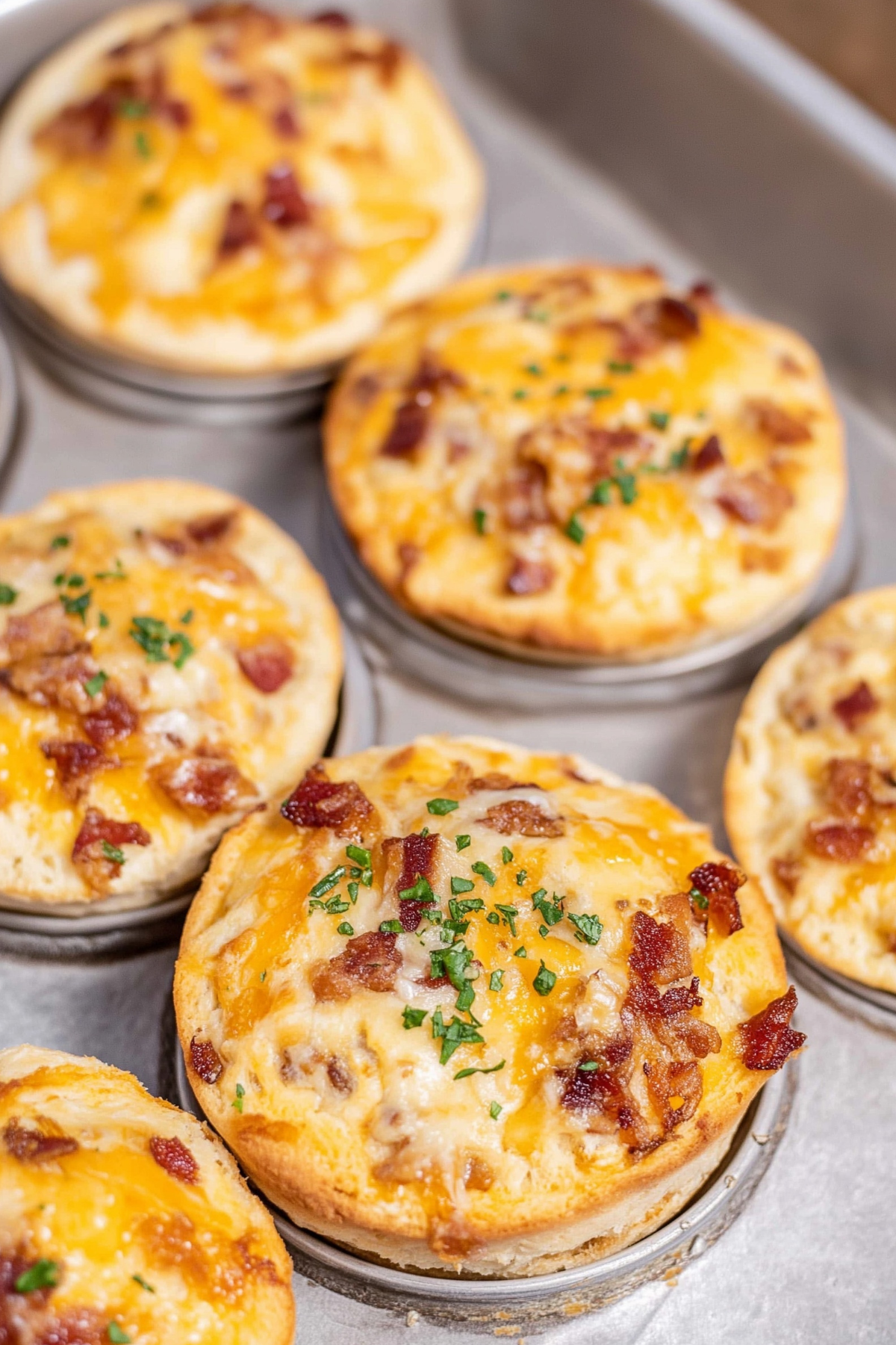 Crack Chicken Biscuits baked in muffin tin with chicken bacon ranch filling