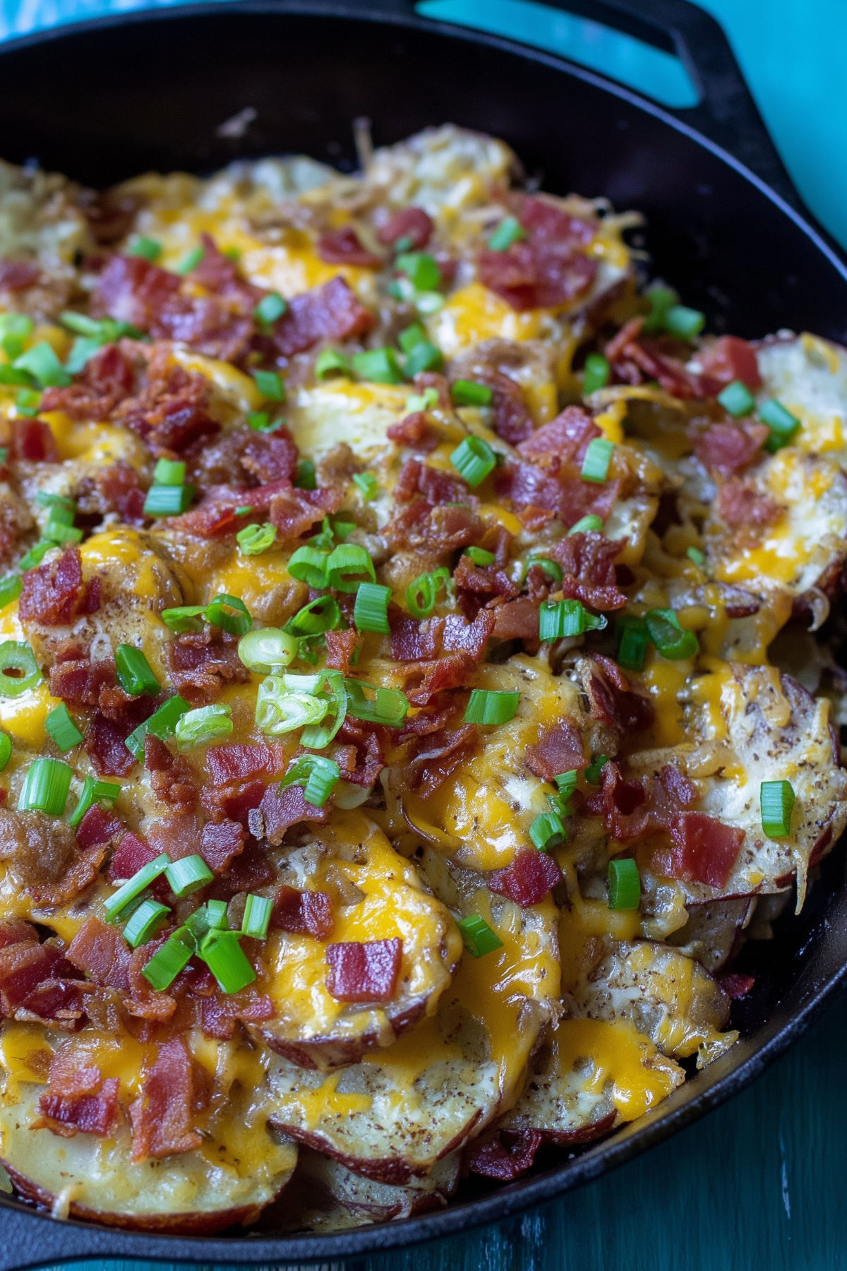 Irish Pub Potato Nachos with crispy potato slices, melted cheese, bacon, and green onions