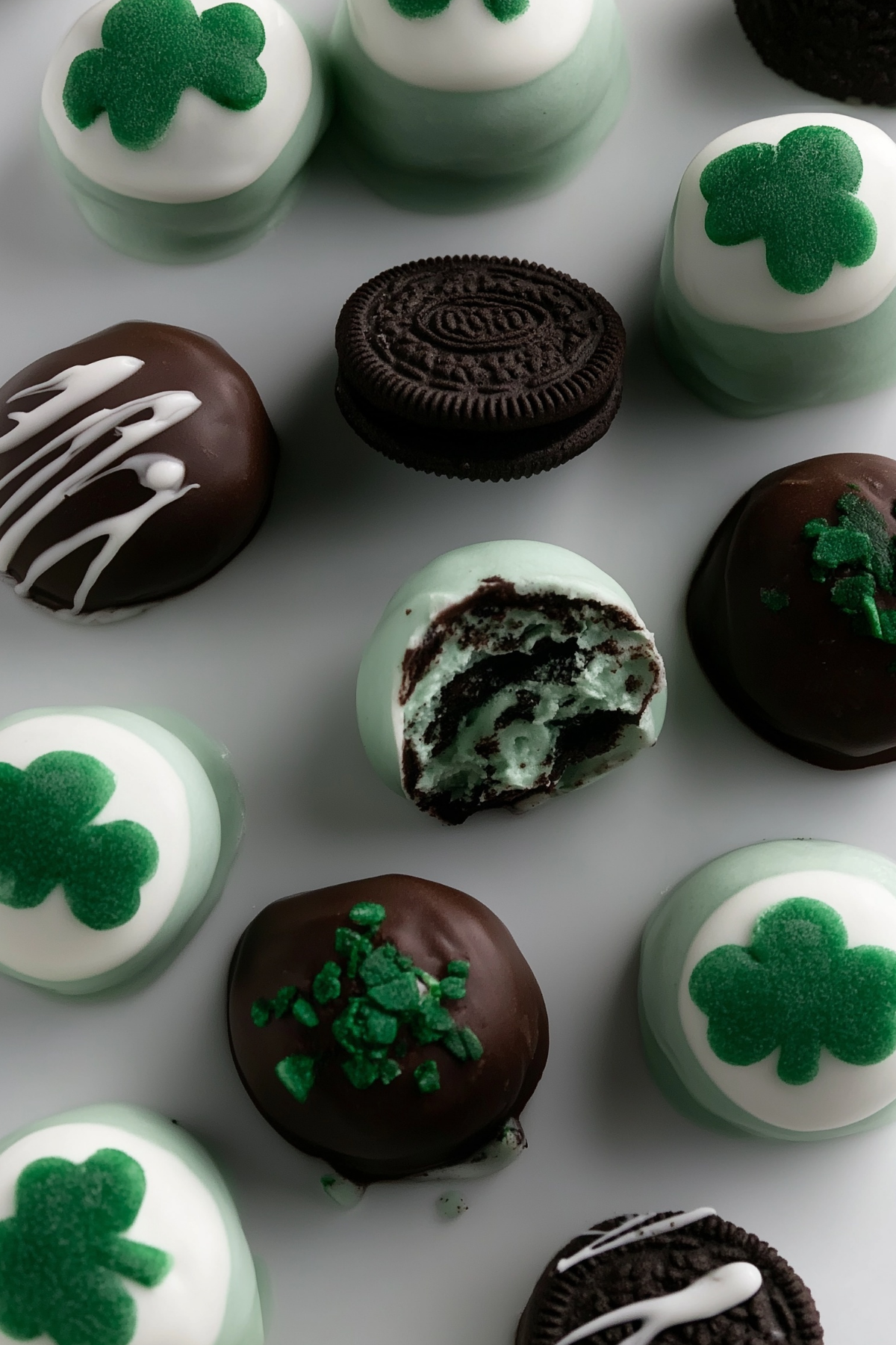 Mint Oreo Truffles dipped in white chocolate with green sprinkles