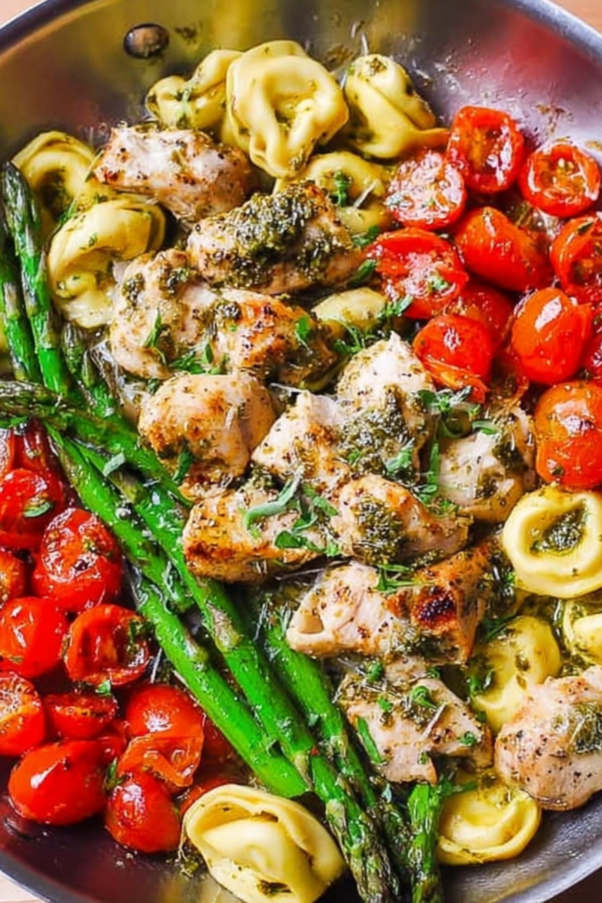 One-pan Pesto Chicken Tortellini and Veggies with fresh vegetables