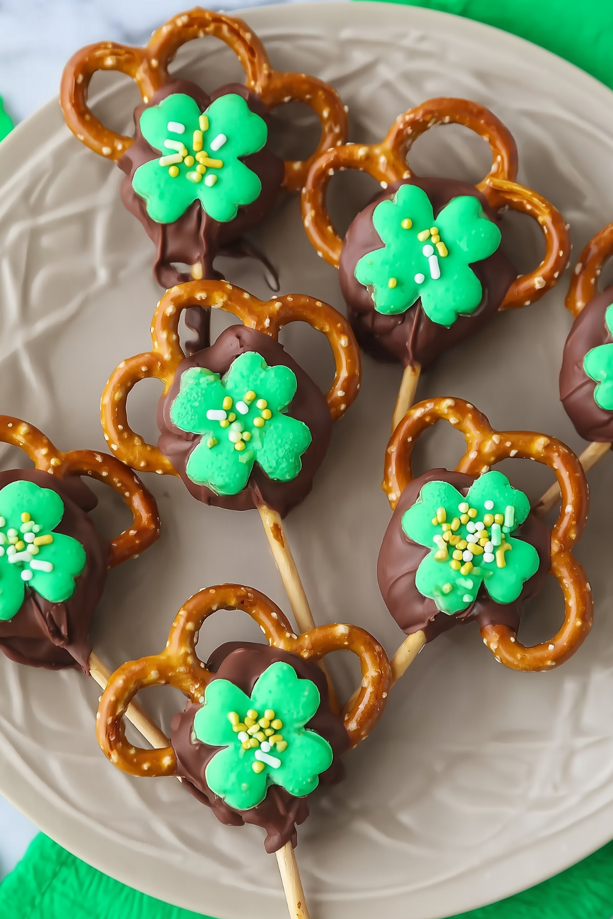 Shamrock Pretzel Pops arranged on a tray for St. Patrick’s Day