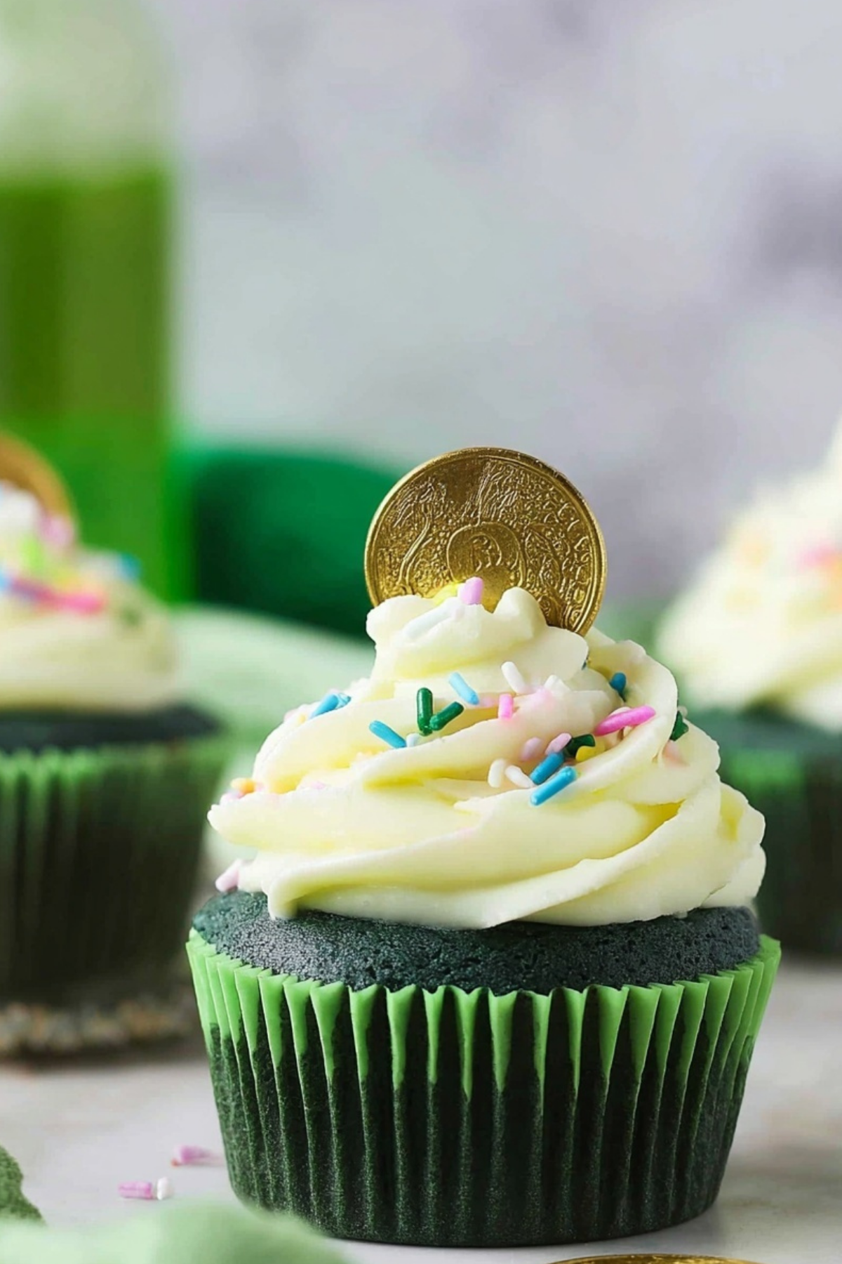 Green Velvet Cupcakes topped with cream cheese frosting