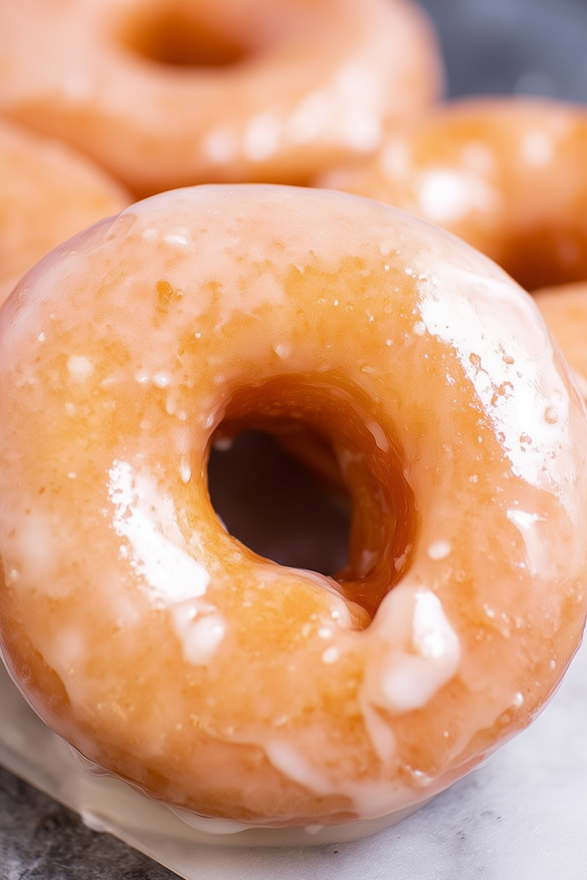 Homemade Krispy Kreme Glazed Doughnuts with classic sugar glaze