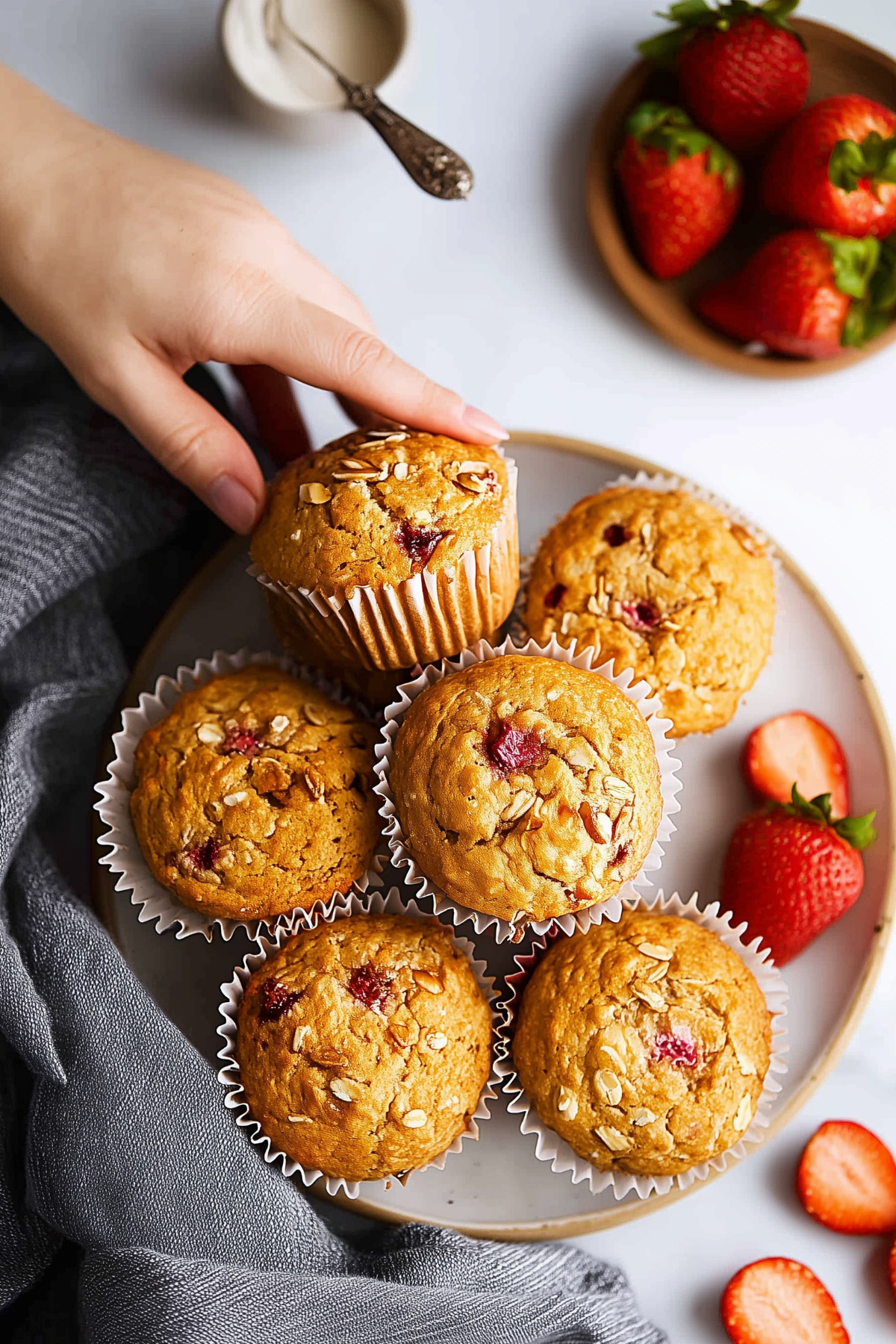 Strawberry oatmeal muffins recipe with fresh strawberries and oats