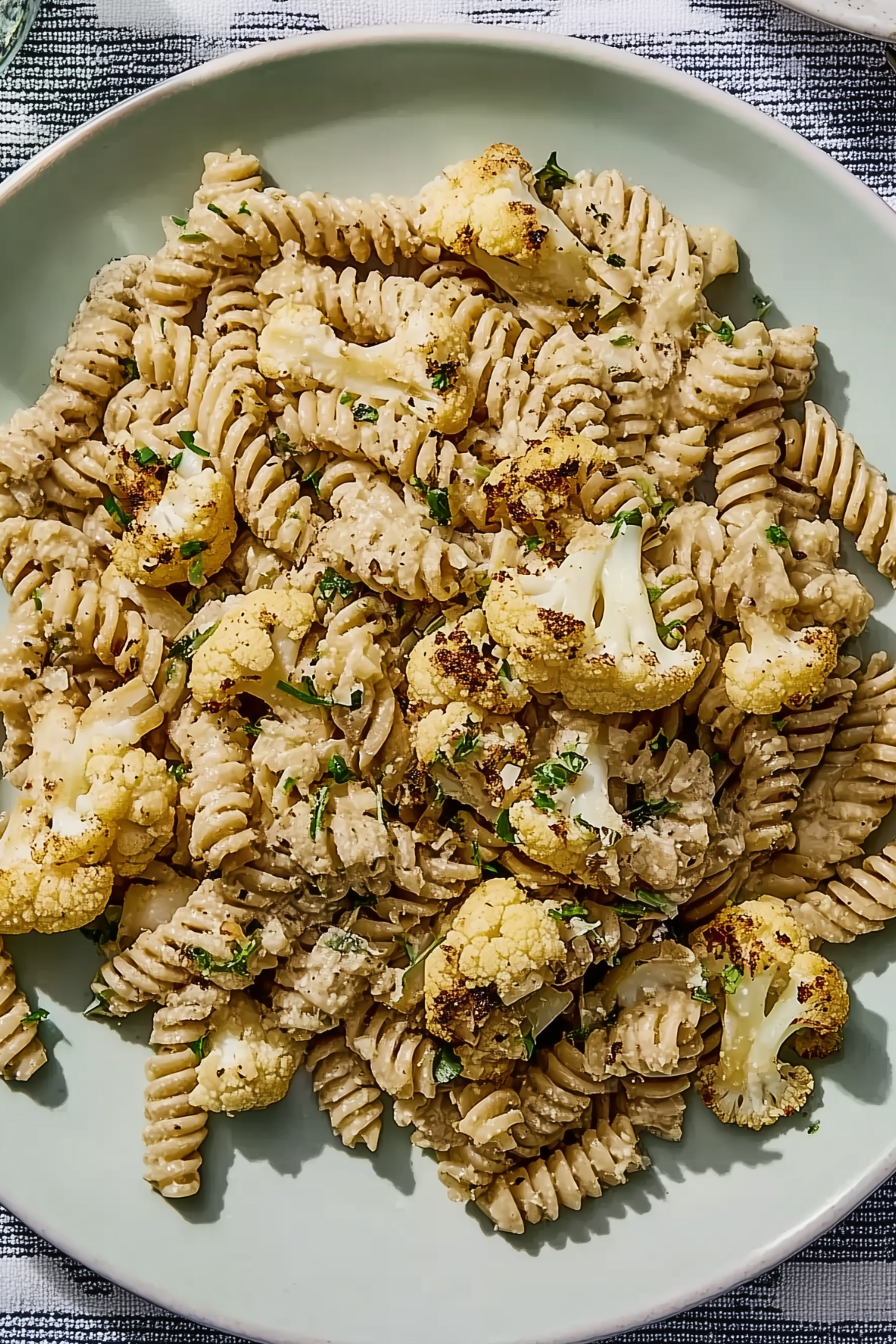 Caramelized Cauliflower Pasta served with creamy sauce and golden roasted cauliflower