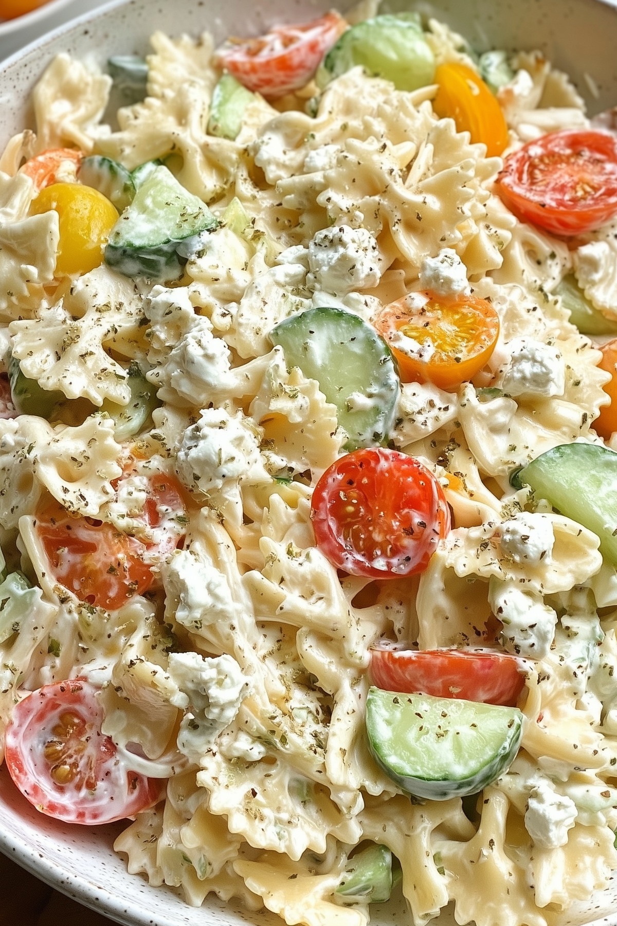 Cottage Cheese Pasta Salad in a bowl with fresh vegetables and creamy dressing