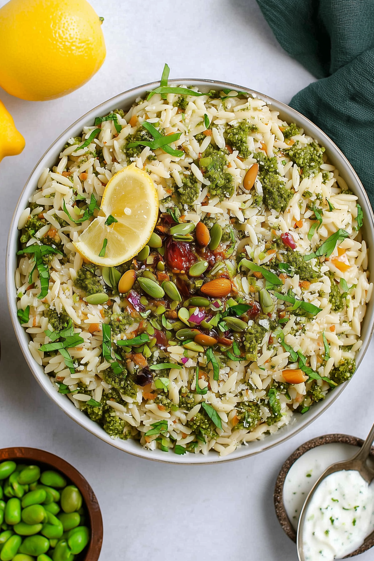 Pesto Orzo Salad with ricotta, peas, and pistachios