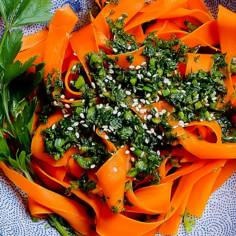 Vibrant Carrot Ribbon Salad with lemon dressing and fresh herbs